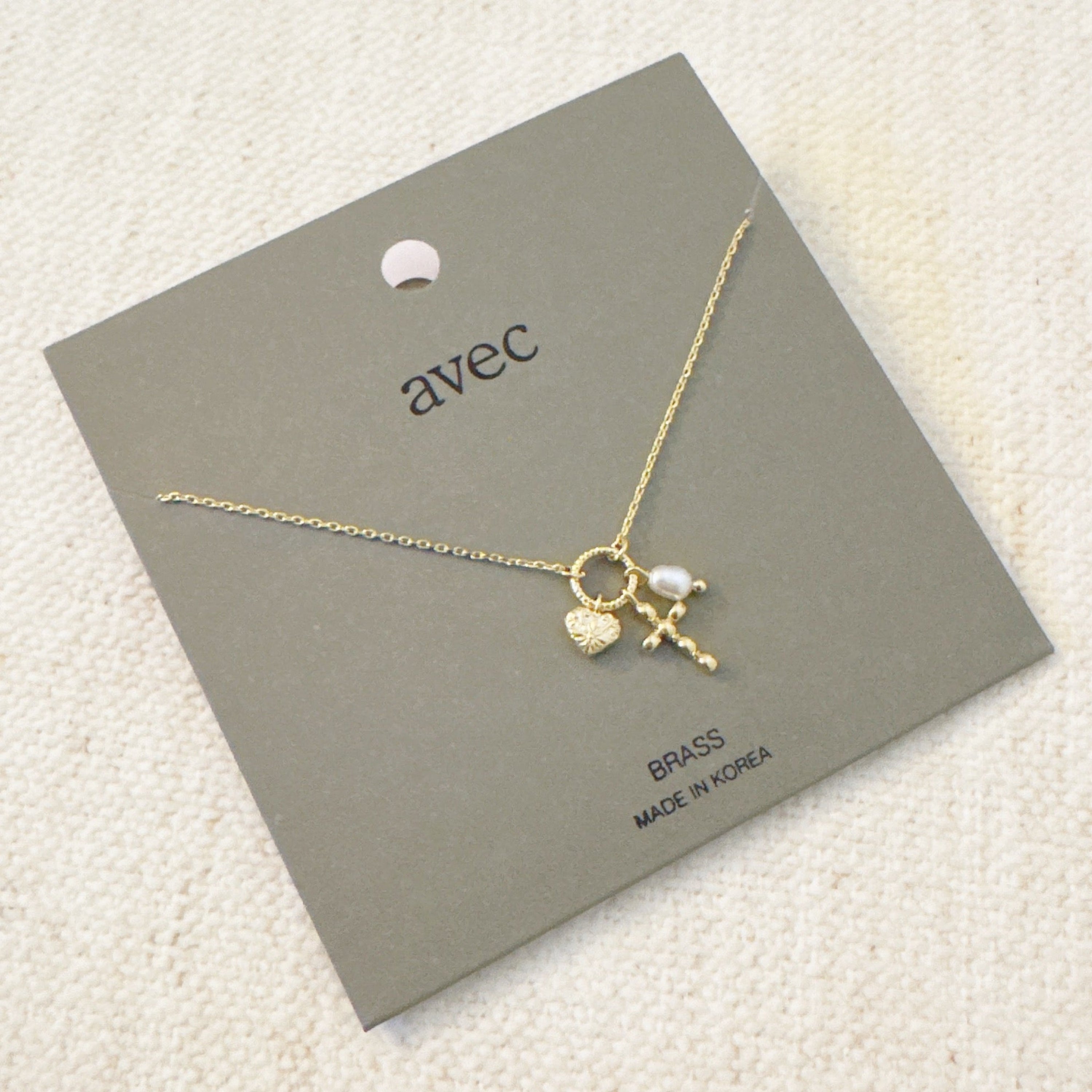 Faith & Love Charm Necklace – Gold-Tone Chain with Heart, Cross, and Pearl Charms