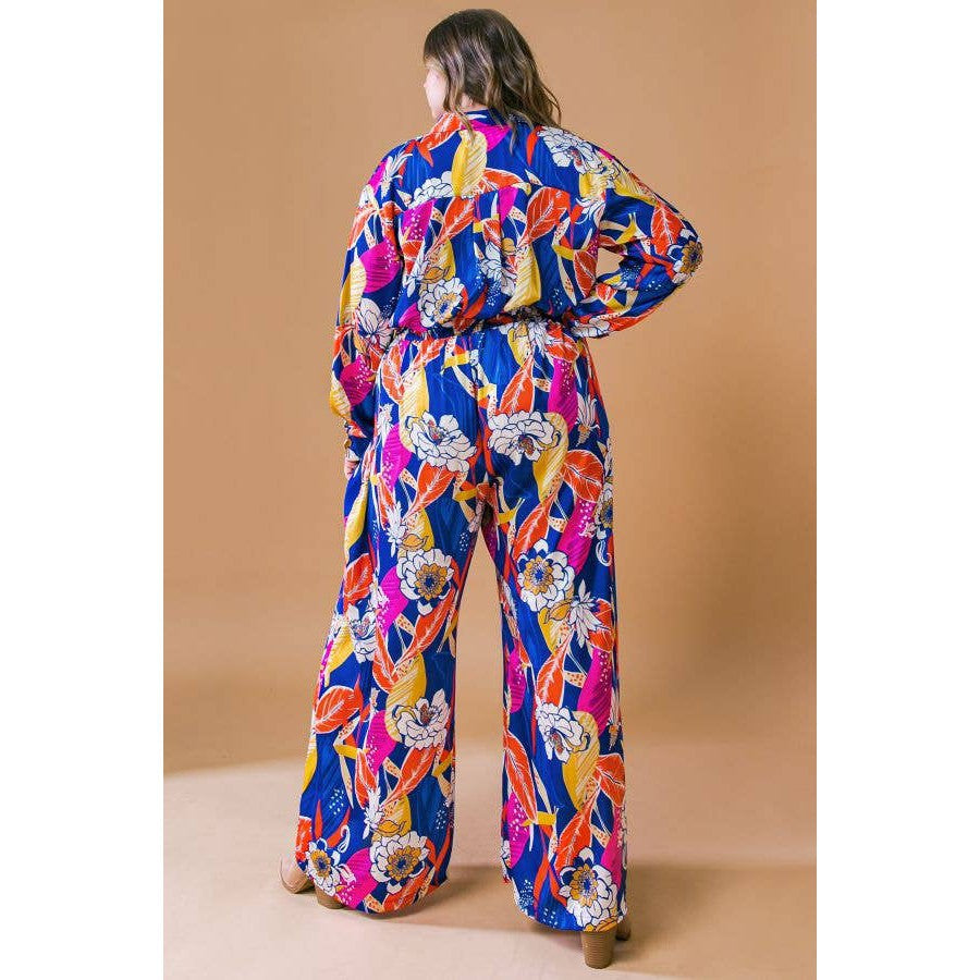 Printed Woven Jumpsuit in Blue with Flowers And Leaf Designs | Long Sleeve Romper