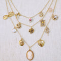 Vintage Rose Charm Layered Necklace – Romantic Multi-Strand Chain with Antique-Inspired Cameo Details