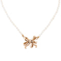 Gifted Freshwater White Pearl Golden Bow Pendant Necklace